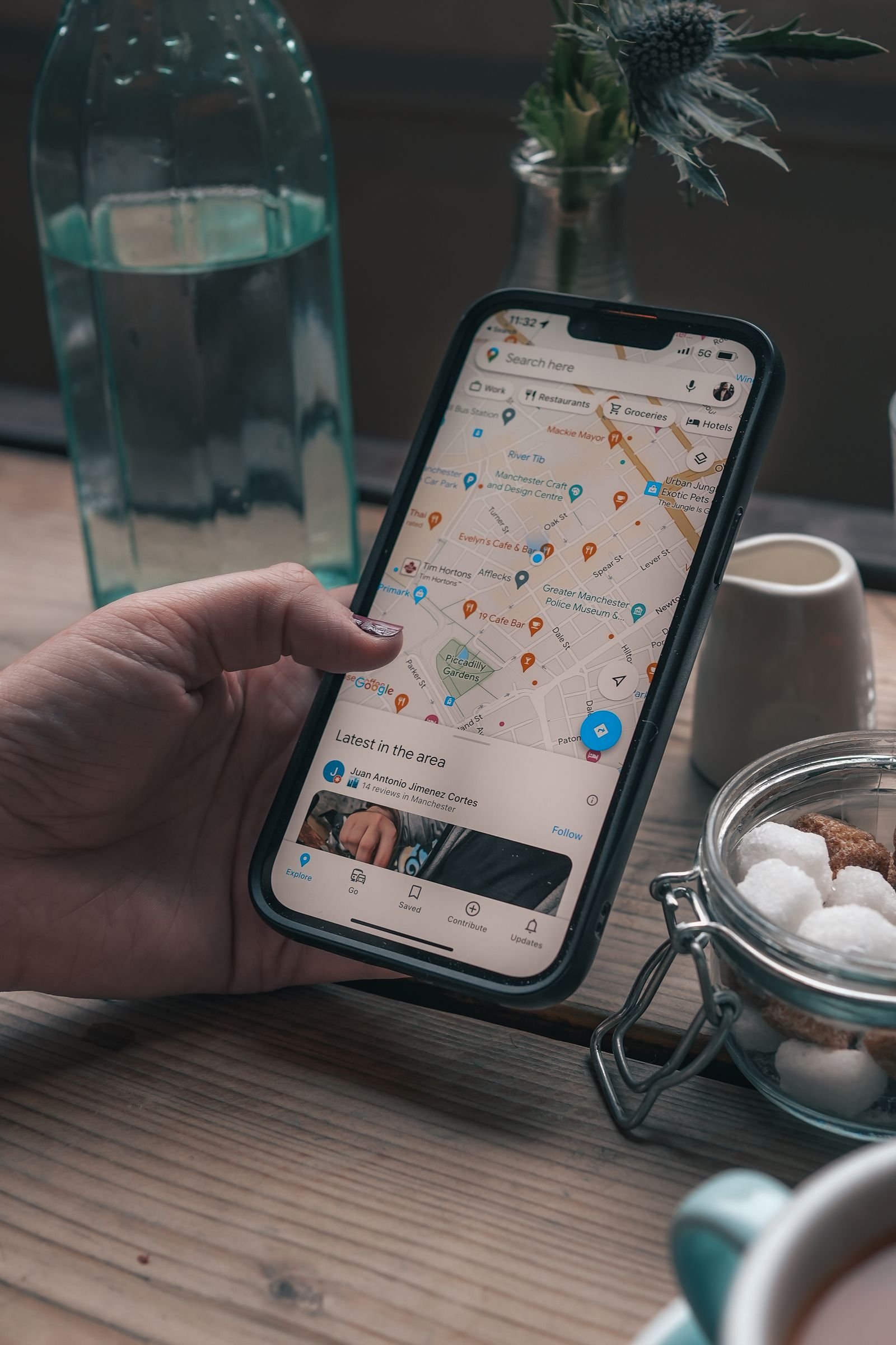 Smartphone showing a Google Maps search a customer uses to find a Florida detailing shop
