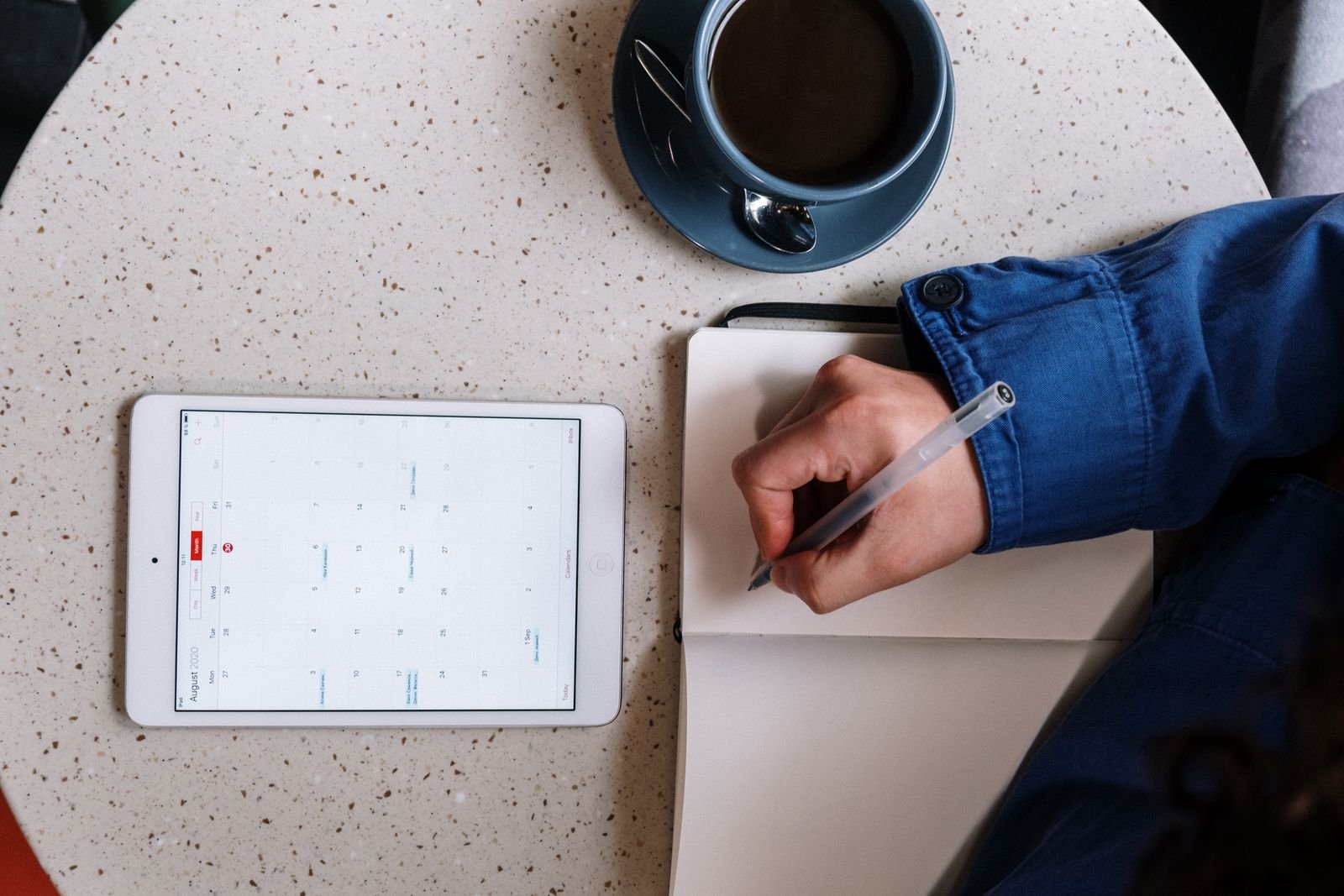 Service advisor managing multi-bay scheduling on a digital tablet