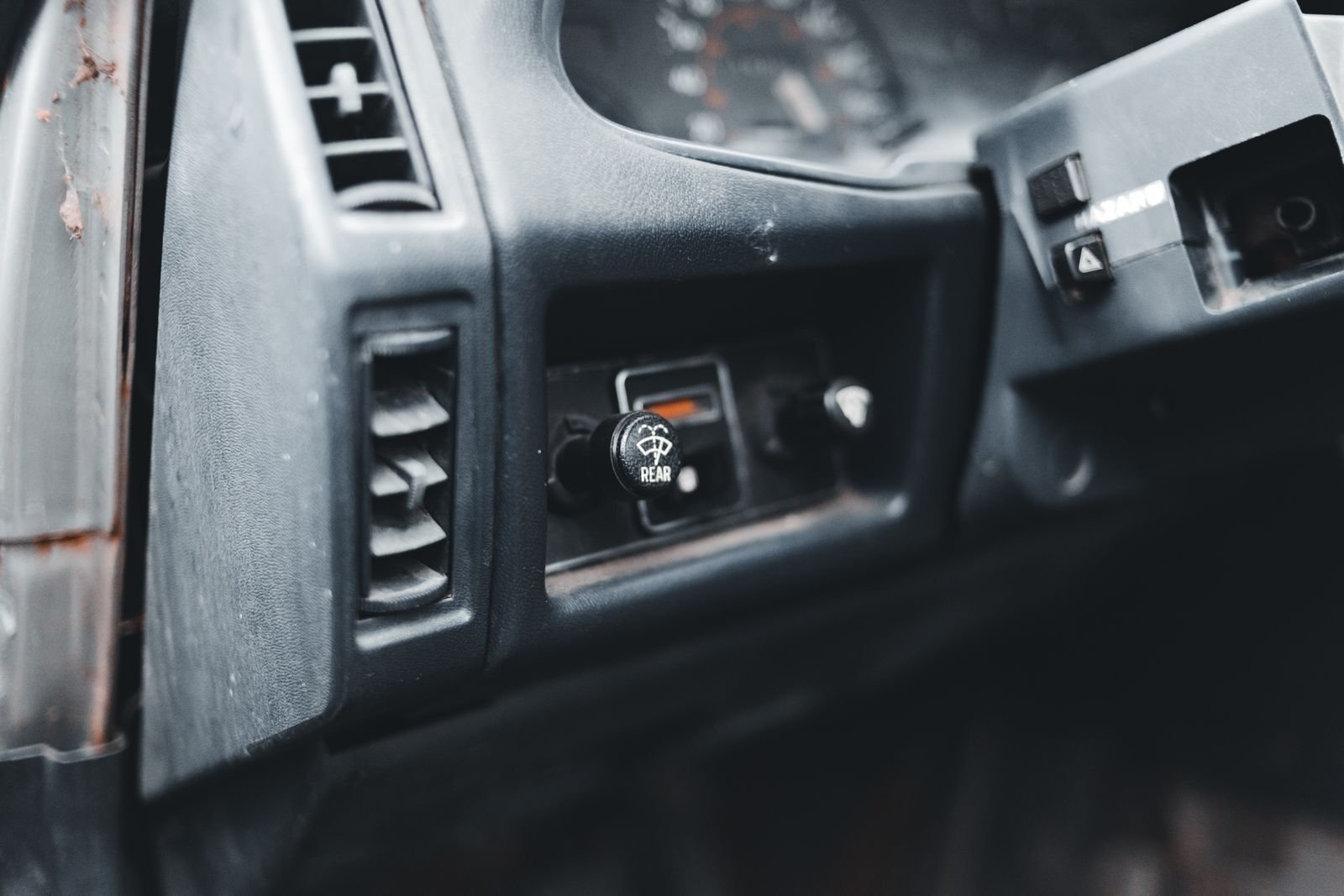 Car dashboard showing wear from Florida sun and UV exposure