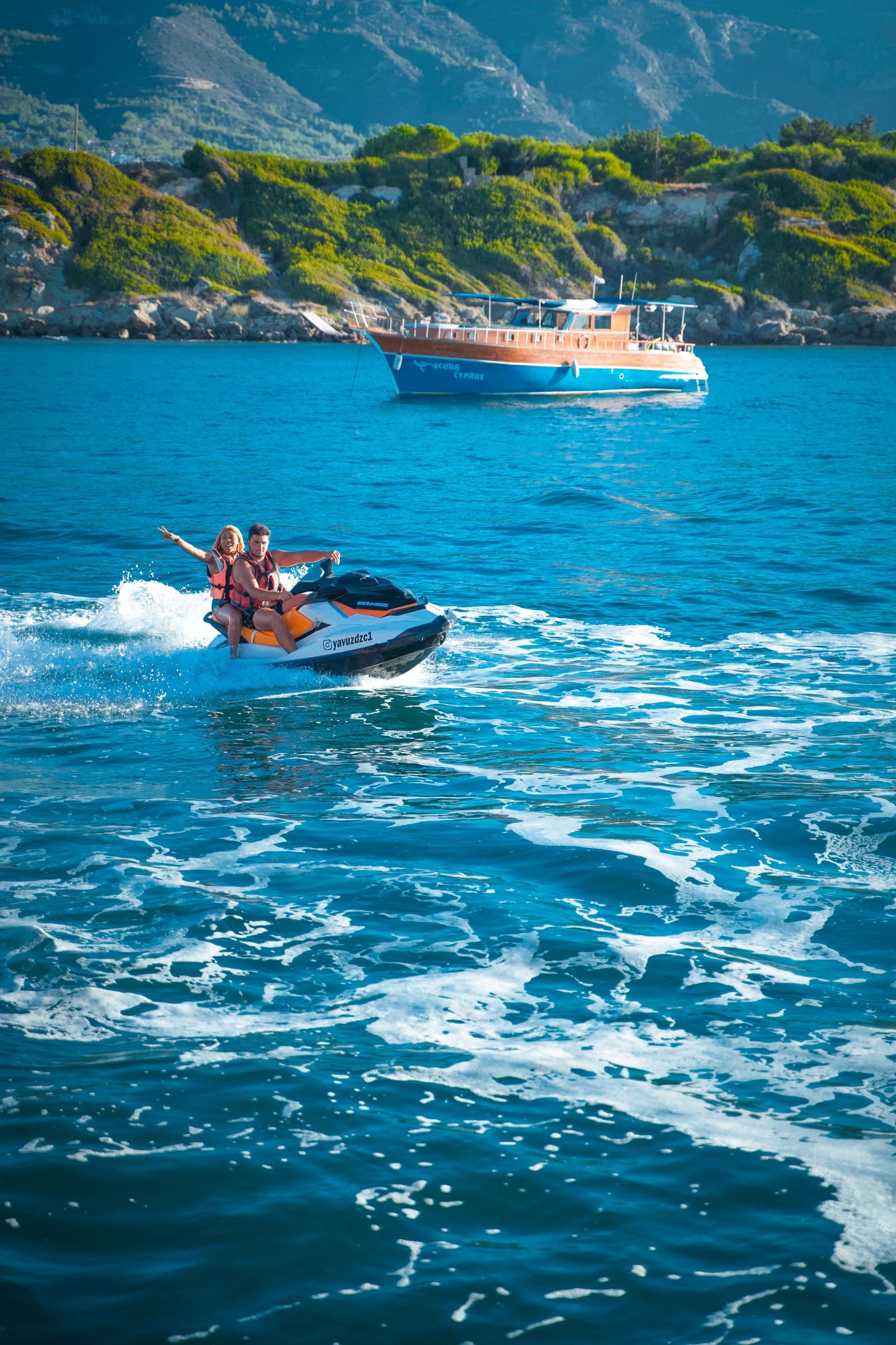 Man and woman riding a jet ski, a common booking for marine rental marketing in Fort Lauderdale Florida